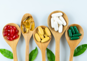 wooden spoons holding supplements