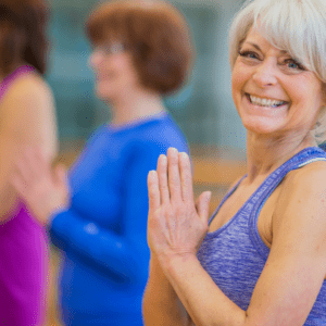 Woman Smiling in Yoga class