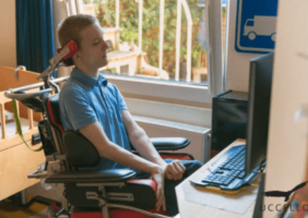 Disabled man playing online games