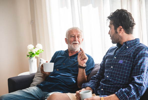 Father and Son enjoying coffee together