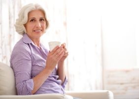 elderly woman drinking tea