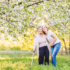 Elderly woman and young woman enjoying the spring blooms